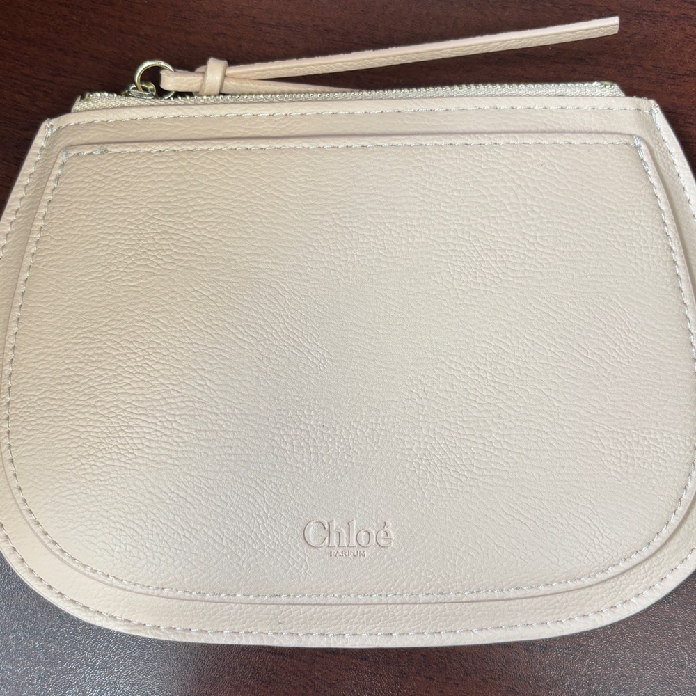 Small blush pink Chloe parfum bag. New faux leather zip pouch.